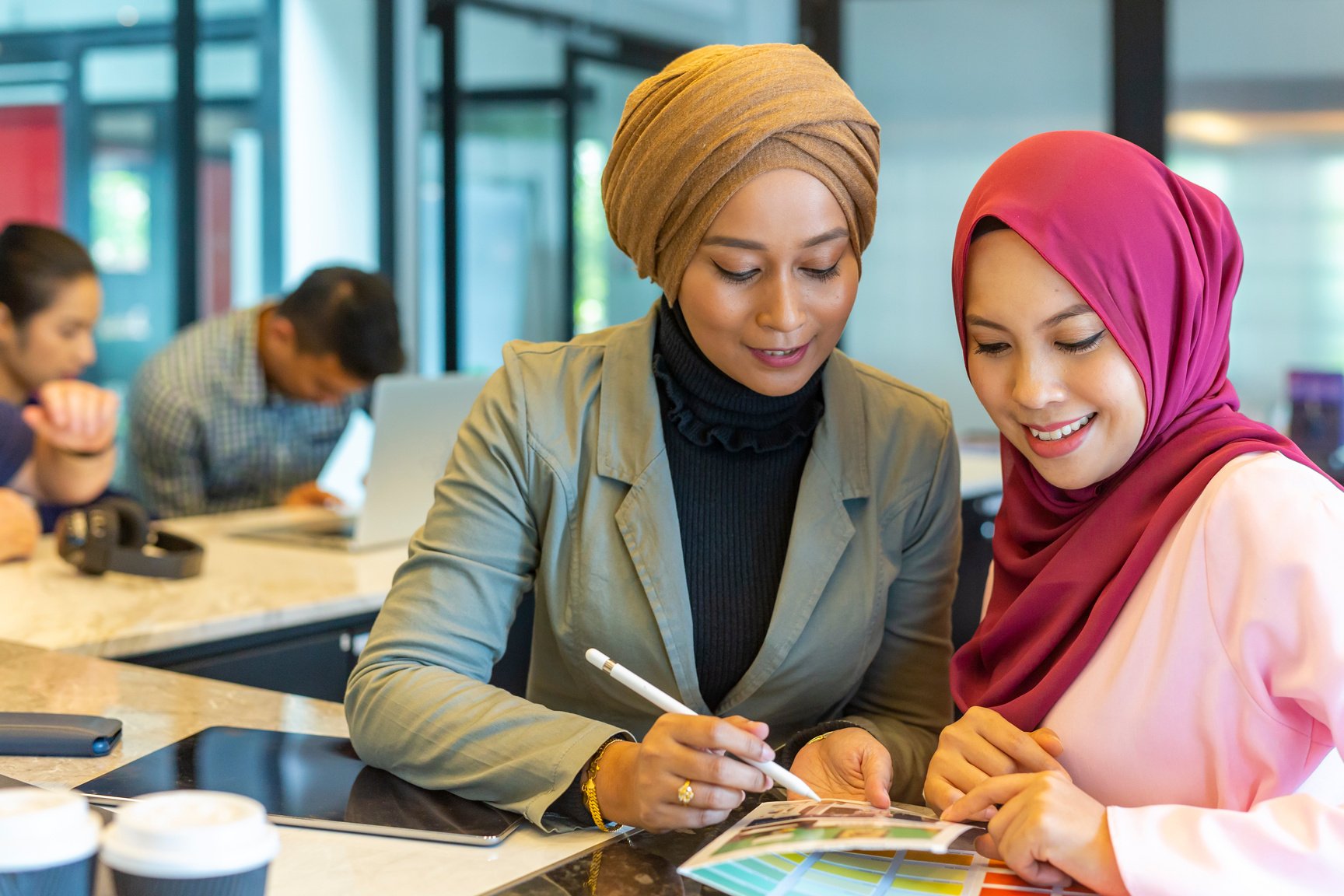 Professional Muslim Business Women Looking at Colour Charts